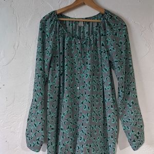 Long sleeve button down top.